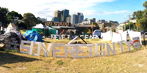 The Redfern Tent Embassy. A sign reads 'Sovereignty Never Ceded'